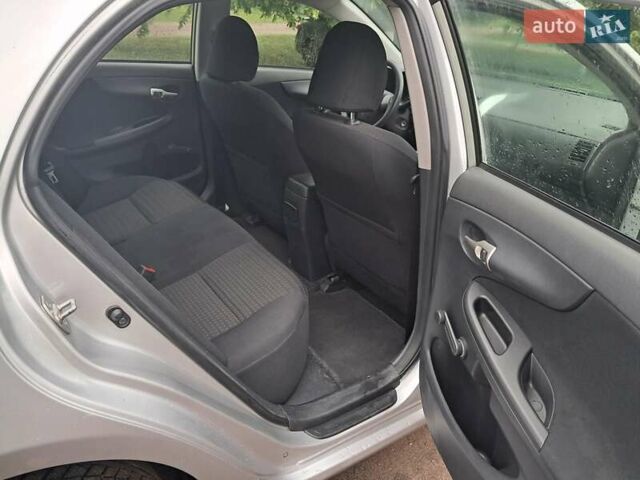 Серый Тойота Королла, объемом двигателя 1.3 л и пробегом 190 тыс. км за 7100 $, фото 1 на Automoto.ua