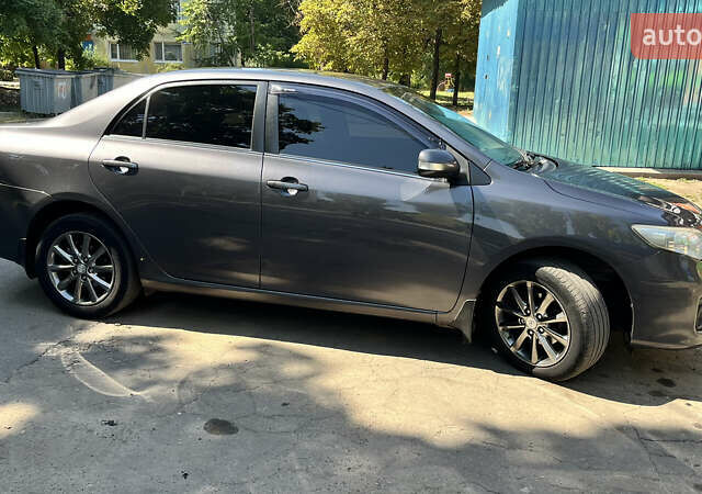 Сірий Тойота Королла, об'ємом двигуна 1.6 л та пробігом 240 тис. км за 9200 $, фото 3 на Automoto.ua