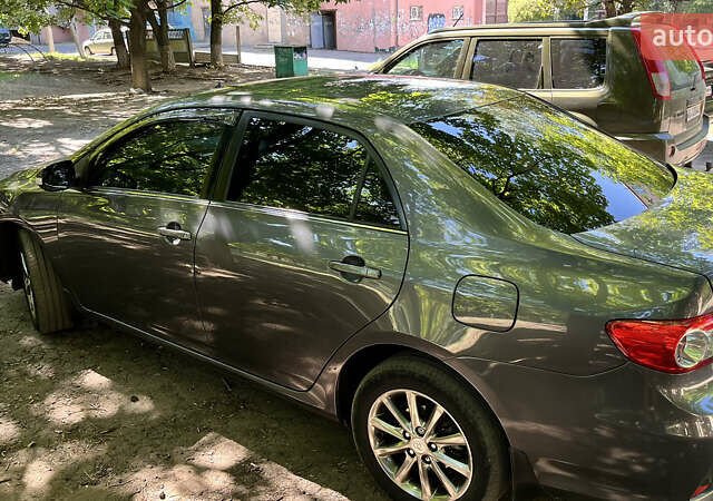 Сірий Тойота Королла, об'ємом двигуна 1.6 л та пробігом 240 тис. км за 9200 $, фото 60 на Automoto.ua