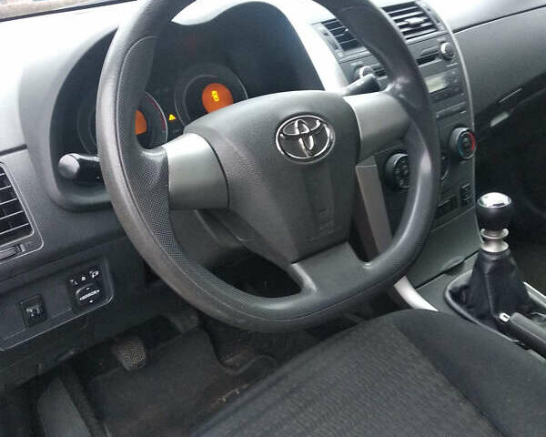 Серый Тойота Королла, объемом двигателя 1.33 л и пробегом 135 тыс. км за 7600 $, фото 4 на Automoto.ua