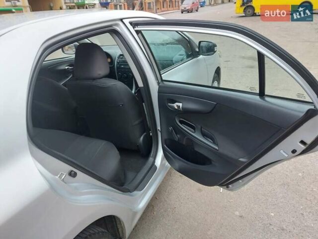 Серый Тойота Королла, объемом двигателя 1.4 л и пробегом 178 тыс. км за 9200 $, фото 24 на Automoto.ua