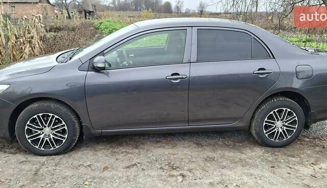 Серый Тойота Королла, объемом двигателя 1.33 л и пробегом 205 тыс. км за 6999 $, фото 1 на Automoto.ua