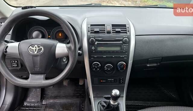 Серый Тойота Королла, объемом двигателя 1.33 л и пробегом 205 тыс. км за 6999 $, фото 5 на Automoto.ua