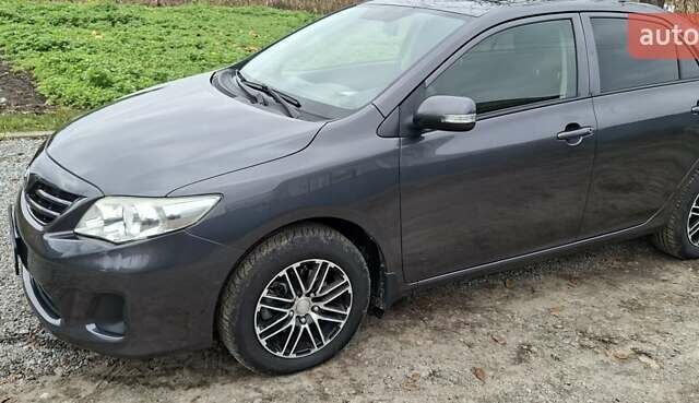 Серый Тойота Королла, объемом двигателя 1.4 л и пробегом 202 тыс. км за 7700 $, фото 1 на Automoto.ua