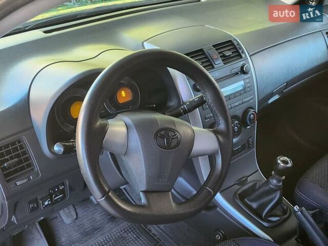 Серый Тойота Королла, объемом двигателя 1.33 л и пробегом 177 тыс. км за 7500 $, фото 14 на Automoto.ua