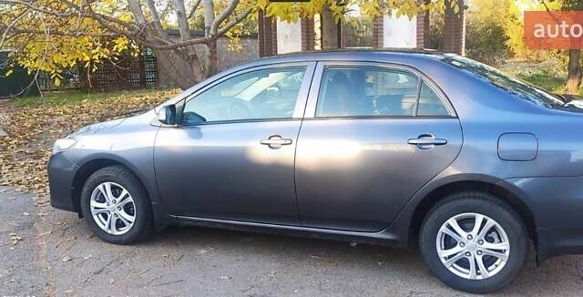 Серый Тойота Королла, объемом двигателя 1.33 л и пробегом 182 тыс. км за 7700 $, фото 1 на Automoto.ua