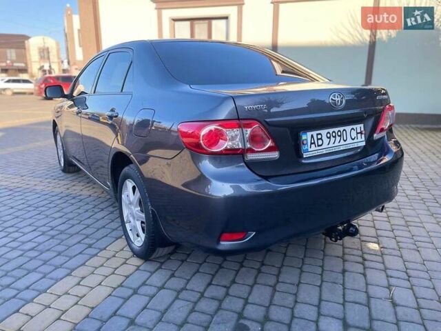 Сірий Тойота Королла, об'ємом двигуна 1.6 л та пробігом 180 тис. км за 10299 $, фото 6 на Automoto.ua