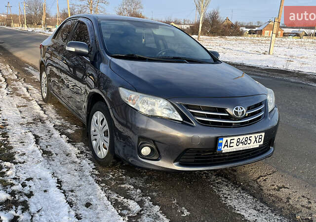 Сірий Тойота Королла, об'ємом двигуна 1.6 л та пробігом 240 тис. км за 9200 $, фото 12 на Automoto.ua