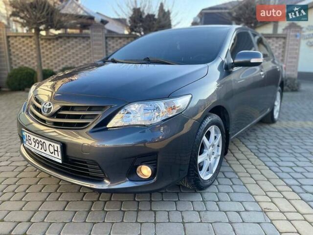 Сірий Тойота Королла, об'ємом двигуна 1.6 л та пробігом 180 тис. км за 10299 $, фото 1 на Automoto.ua