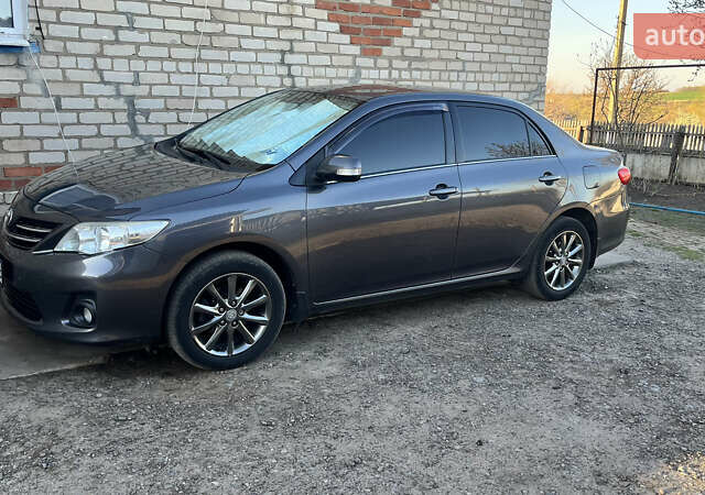 Сірий Тойота Королла, об'ємом двигуна 1.6 л та пробігом 240 тис. км за 9200 $, фото 5 на Automoto.ua