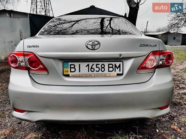 Сірий Тойота Королла, об'ємом двигуна 1.33 л та пробігом 114 тис. км за 10500 $, фото 1 на Automoto.ua