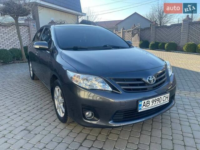 Сірий Тойота Королла, об'ємом двигуна 1.6 л та пробігом 180 тис. км за 10299 $, фото 14 на Automoto.ua