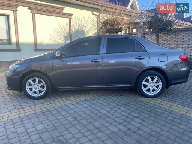 Сірий Тойота Королла, об'ємом двигуна 1.6 л та пробігом 180 тис. км за 10299 $, фото 4 на Automoto.ua