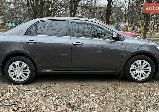Сірий Тойота Королла, об'ємом двигуна 1.6 л та пробігом 240 тис. км за 9200 $, фото 17 на Automoto.ua