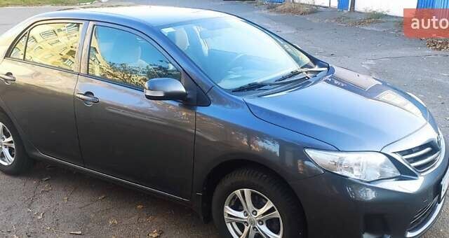 Серый Тойота Королла, объемом двигателя 1.33 л и пробегом 182 тыс. км за 7700 $, фото 3 на Automoto.ua