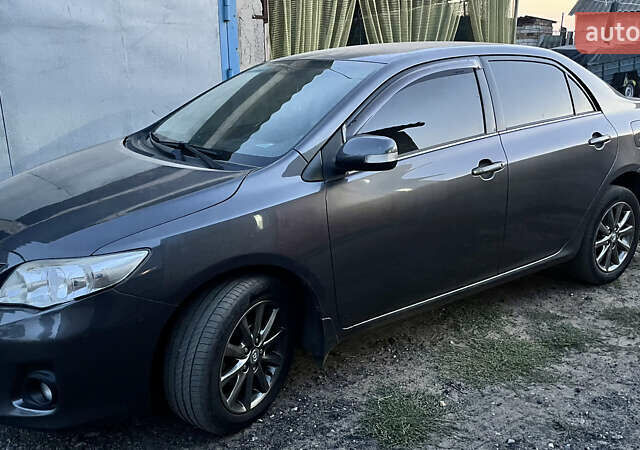 Сірий Тойота Королла, об'ємом двигуна 1.6 л та пробігом 240 тис. км за 9200 $, фото 1 на Automoto.ua