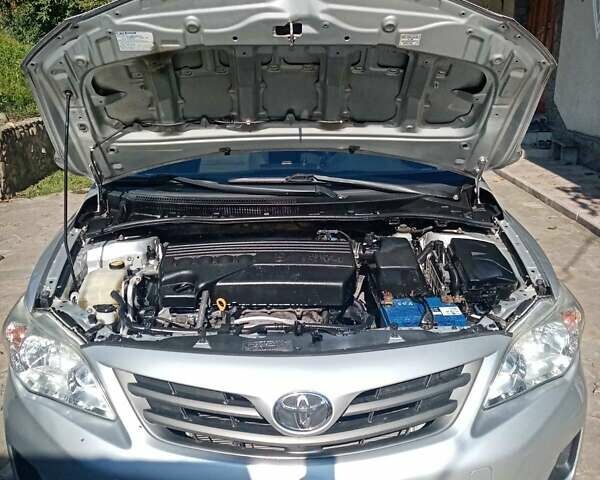 Сірий Тойота Королла, об'ємом двигуна 1.33 л та пробігом 220 тис. км за 7300 $, фото 3 на Automoto.ua