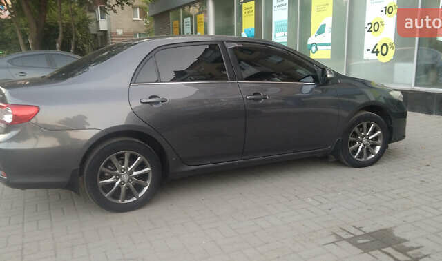 Сірий Тойота Королла, об'ємом двигуна 1.6 л та пробігом 240 тис. км за 9200 $, фото 48 на Automoto.ua