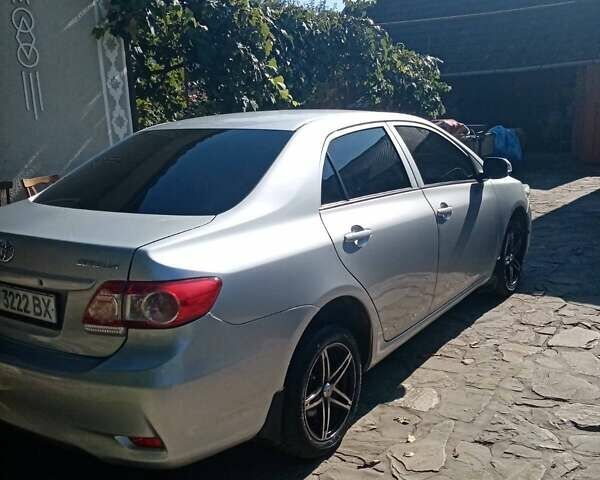 Сірий Тойота Королла, об'ємом двигуна 1.33 л та пробігом 220 тис. км за 7300 $, фото 10 на Automoto.ua