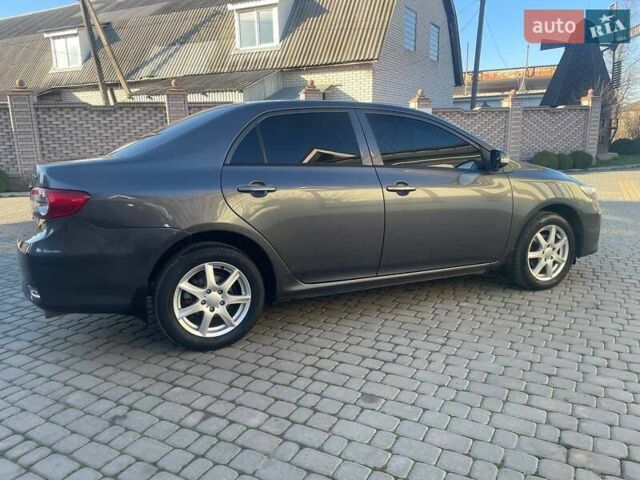 Сірий Тойота Королла, об'ємом двигуна 1.6 л та пробігом 180 тис. км за 10299 $, фото 11 на Automoto.ua