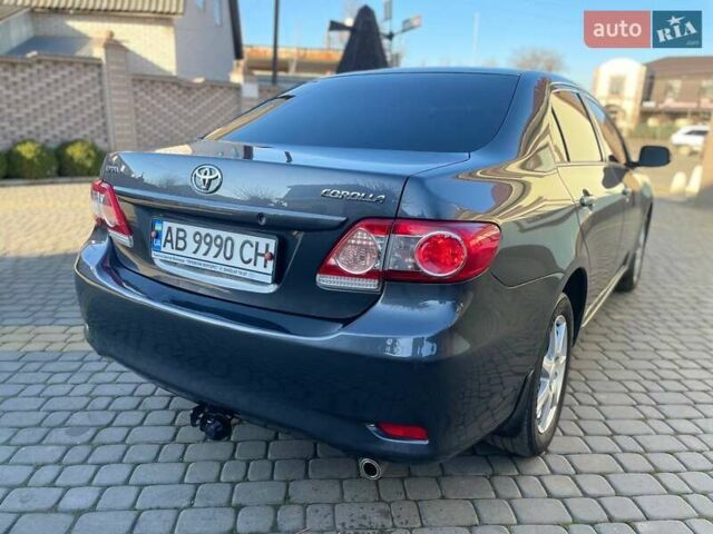Сірий Тойота Королла, об'ємом двигуна 1.6 л та пробігом 180 тис. км за 10299 $, фото 9 на Automoto.ua
