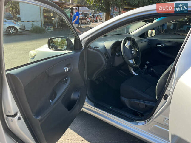 Сірий Тойота Королла, об'ємом двигуна 1.33 л та пробігом 195 тис. км за 8900 $, фото 7 на Automoto.ua