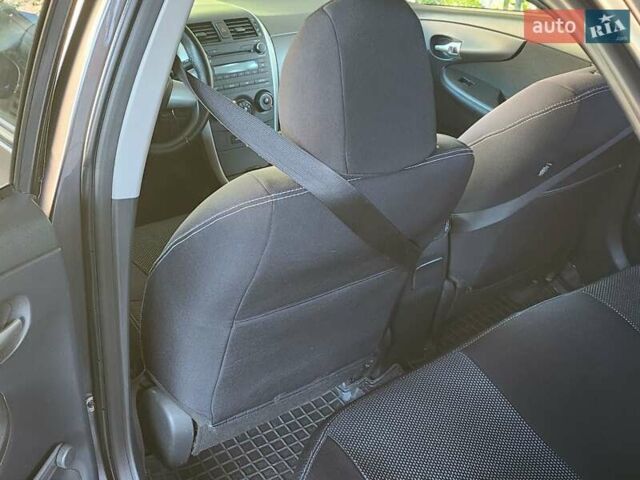 Серый Тойота Королла, объемом двигателя 1.33 л и пробегом 177 тыс. км за 7500 $, фото 11 на Automoto.ua
