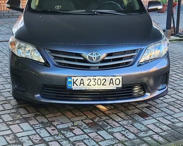 Серый Тойота Королла, объемом двигателя 1.33 л и пробегом 177 тыс. км за 7500 $, фото 4 на Automoto.ua