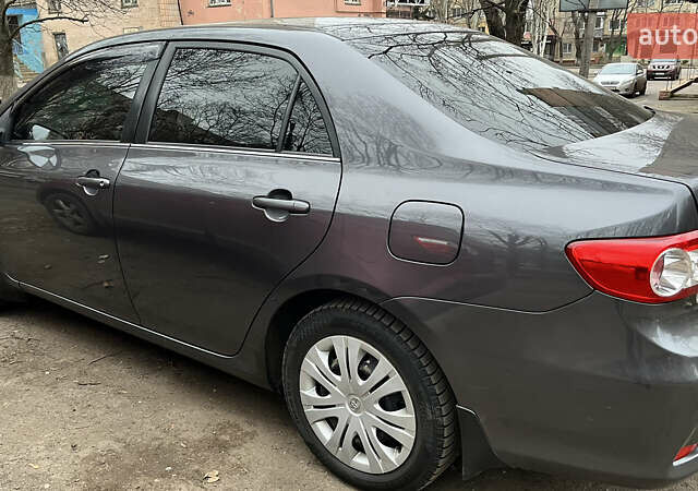 Сірий Тойота Королла, об'ємом двигуна 1.6 л та пробігом 240 тис. км за 9200 $, фото 15 на Automoto.ua