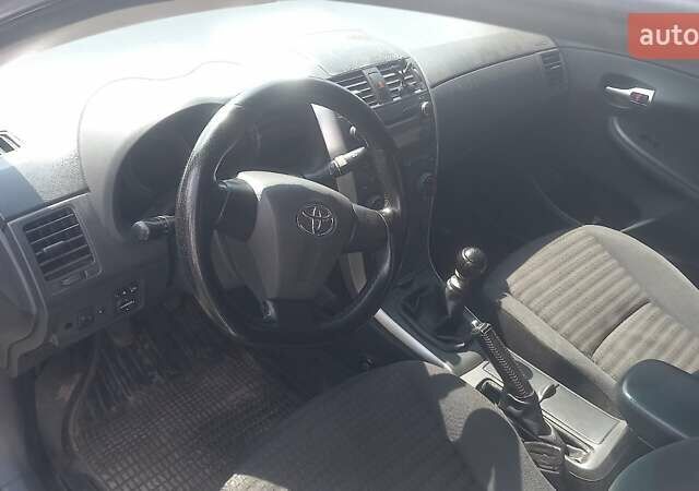 Серый Тойота Королла, объемом двигателя 1.33 л и пробегом 240 тыс. км за 5999 $, фото 3 на Automoto.ua