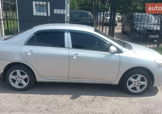 Сірий Тойота Королла, об'ємом двигуна 1.33 л та пробігом 240 тис. км за 6200 $, фото 2 на Automoto.ua