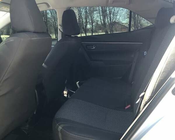 Серый Тойота Королла, объемом двигателя 1.3 л и пробегом 91 тыс. км за 12400 $, фото 5 на Automoto.ua