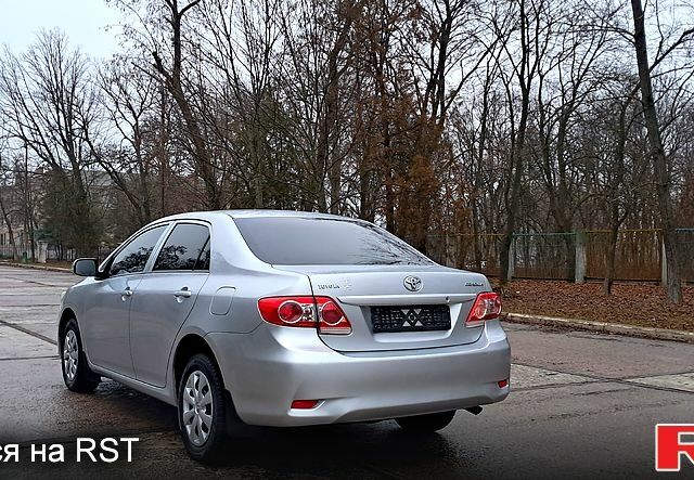 Серый Тойота Королла, объемом двигателя 13 л и пробегом 115 тыс. км за 8500 $, фото 1 на Automoto.ua