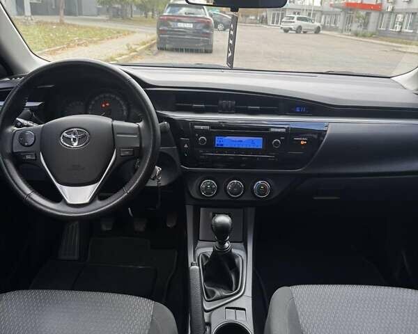 Серый Тойота Королла, объемом двигателя 1.33 л и пробегом 143 тыс. км за 11300 $, фото 2 на Automoto.ua