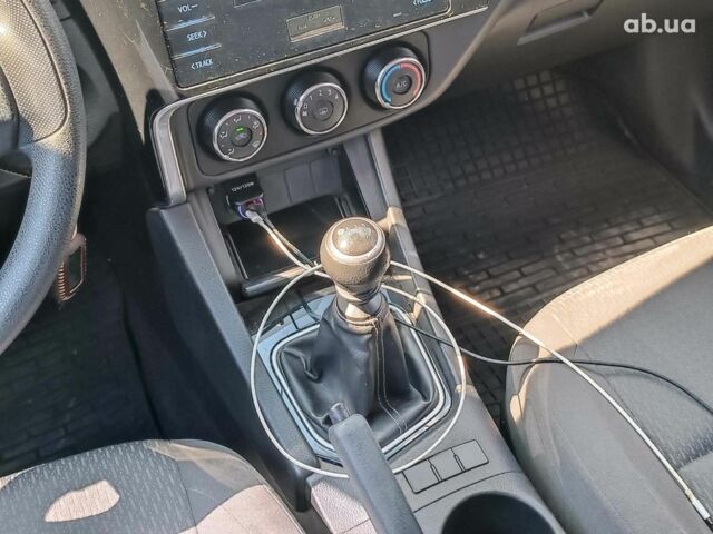 Серый Тойота Королла, объемом двигателя 1.3 л и пробегом 124 тыс. км за 10990 $, фото 14 на Automoto.ua