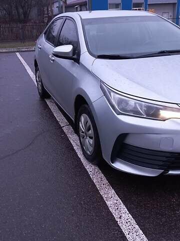 Серый Тойота Королла, объемом двигателя 1.33 л и пробегом 133 тыс. км за 10900 $, фото 1 на Automoto.ua