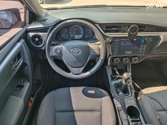 Серый Тойота Королла, объемом двигателя 1.3 л и пробегом 124 тыс. км за 10990 $, фото 12 на Automoto.ua