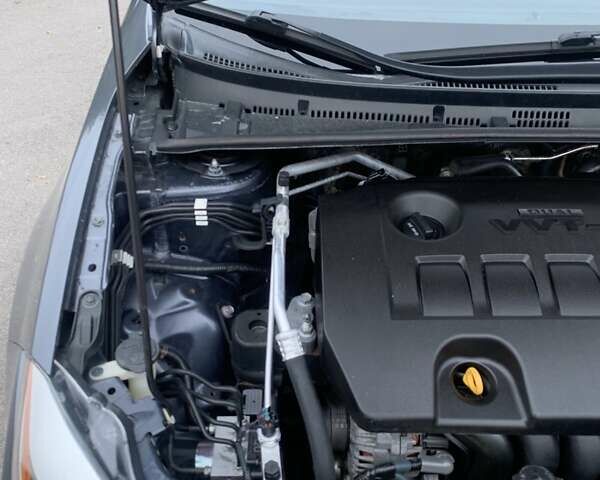 Сірий Тойота Королла, об'ємом двигуна 1.8 л та пробігом 92 тис. км за 9000 $, фото 10 на Automoto.ua