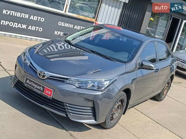 Сірий Тойота Королла, об'ємом двигуна 1.3 л та пробігом 124 тис. км за 10990 $, фото 2 на Automoto.ua