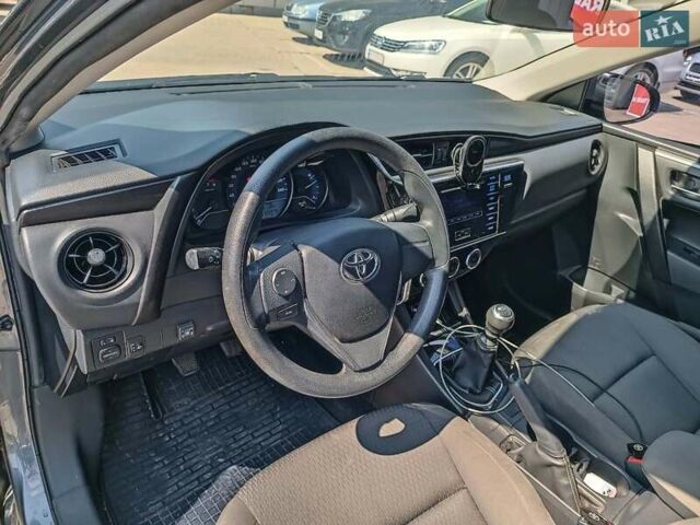 Сірий Тойота Королла, об'ємом двигуна 1.3 л та пробігом 124 тис. км за 10990 $, фото 19 на Automoto.ua