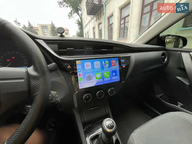 Серый Тойота Королла, объемом двигателя 1.33 л и пробегом 59 тыс. км за 12000 $, фото 20 на Automoto.ua