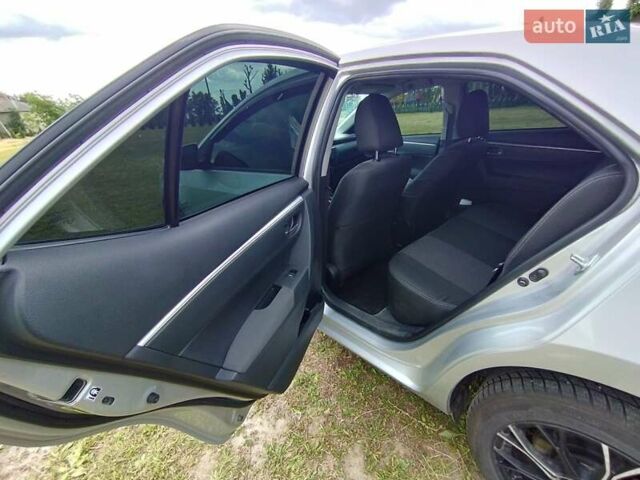 Сірий Тойота Королла, об'ємом двигуна 1.6 л та пробігом 242 тис. км за 13599 $, фото 10 на Automoto.ua