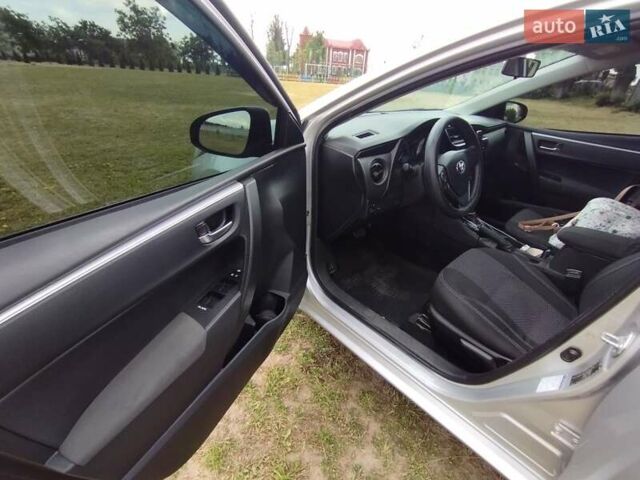Сірий Тойота Королла, об'ємом двигуна 1.6 л та пробігом 242 тис. км за 13599 $, фото 6 на Automoto.ua