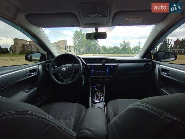 Сірий Тойота Королла, об'ємом двигуна 1.6 л та пробігом 242 тис. км за 13599 $, фото 12 на Automoto.ua