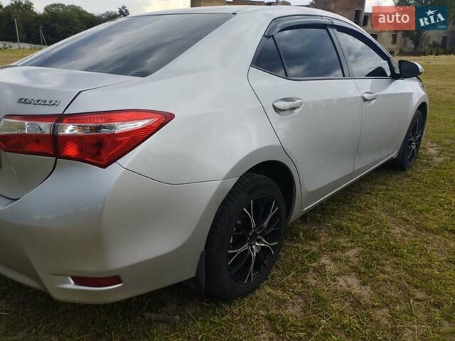 Сірий Тойота Королла, об'ємом двигуна 1.6 л та пробігом 242 тис. км за 13599 $, фото 3 на Automoto.ua