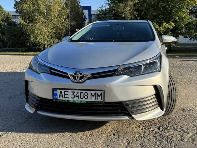 Сірий Тойота Королла, об'ємом двигуна 1.33 л та пробігом 94 тис. км за 12500 $, фото 1 на Automoto.ua