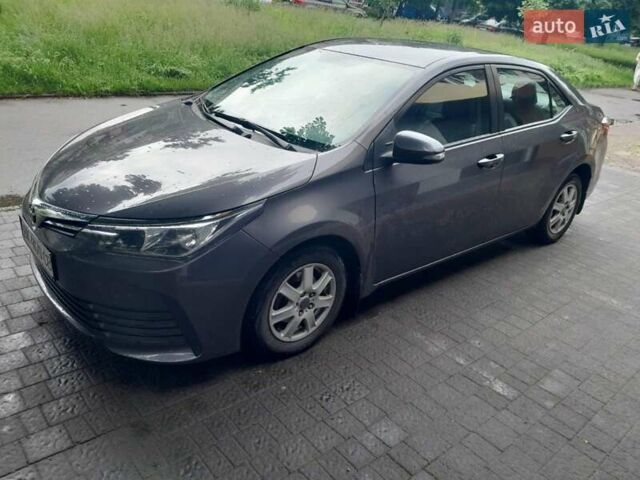 Серый Тойота Королла, объемом двигателя 1.33 л и пробегом 220 тыс. км за 12500 $, фото 3 на Automoto.ua