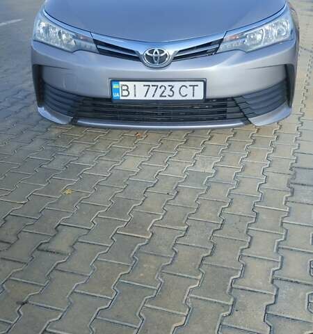 Серый Тойота Королла, объемом двигателя 1.33 л и пробегом 185 тыс. км за 13700 $, фото 4 на Automoto.ua