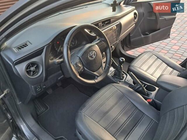 Серый Тойота Королла, объемом двигателя 1.33 л и пробегом 220 тыс. км за 12500 $, фото 6 на Automoto.ua