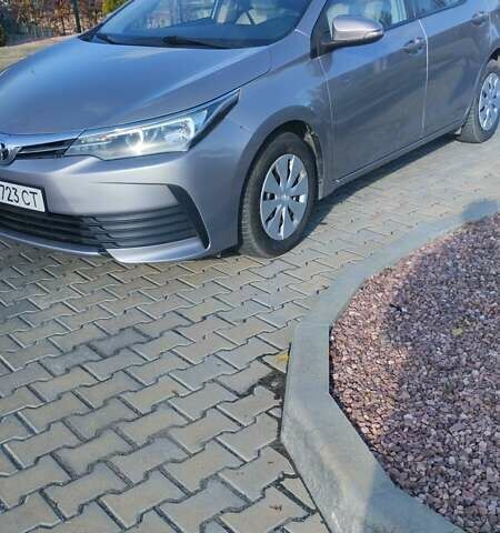 Серый Тойота Королла, объемом двигателя 1.33 л и пробегом 185 тыс. км за 13700 $, фото 3 на Automoto.ua